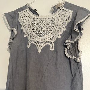 Light blue fluttery top from Loft - size Large
